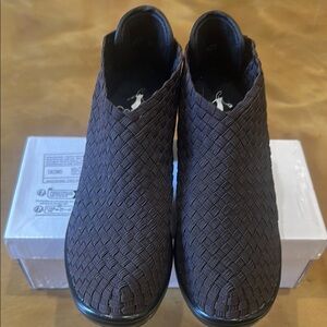 Brown  with black ankle booties.. Super confortable 3 inch heel. Worn twice.